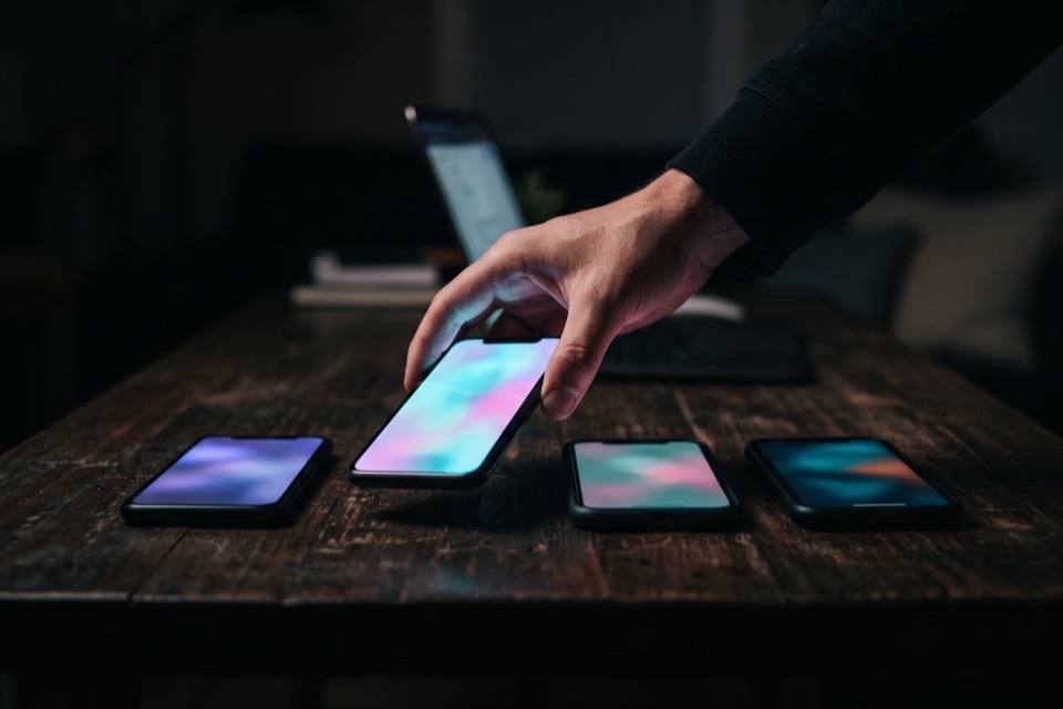 Choosing one phone from several on a table